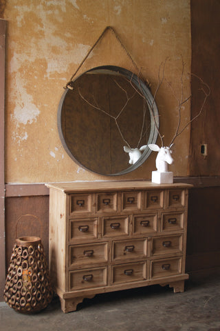 Large round metal mirror with rope hanger